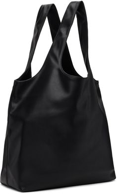 Grained faux-leather tote in black. Logo printed at face. · Twin shoulder straps · Patch pocket at interior · Full cotton twill lining · H14.25 x W19.75 x D6.25 · Total height: 23.5 Supplier color: Black Black Coated Canvas Shoulder Bag For Shopping, Black Coated Canvas Bags For Work, Leather-backed Double Handle Shoulder Bag For Work, Double Handle Leather Backing Shoulder Bag For Work, Black Coated Canvas Shoulder Bag For Work, Chic Black Coated Canvas Shoulder Bag, Face Patches, Small Tote, Black Logo