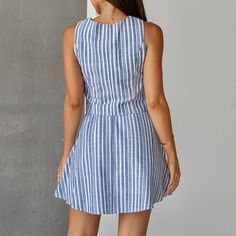 This Women's Summer Blue Striped Cotton Linen Sleeveless Vest and Skirt Set is made of high-quality fabric consisting of 10% linen, 45% polyester, and 45% cotton, offering a soft, comfortable, and skin-friendly experience for everyday wear. The design elements include stylish stripes and a sexy V-neck, showcasing a beautiful neckline. The A-line skirt design accentuates the figure, adding a touch of feminine charm and elegance. Its versatile style makes it the perfect choice for fashionable prof Short Pollera, Business Skirt, Elegant Pant, Casual Outerwear, Elegant Skirt, Summer Dress Outfits, Summer Blue, Casual Skirts, Casual Tank Tops