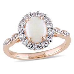 The Everly Women's Opal and Topaz 14k Rose Gold Ring is a beautifully crafted set designed to add elegance to any outfit. Each piece in this set is made from high-quality materials, ensuring durability and style. Perfect for formal occasions or as a thoughtful gift, this set combines sophistication and charm. With its timeless design, it's sure to impress and complement any wardrobe. Whether you're elevating your own style or gifting it to someone special, this jewelry set is a must-have. Size: Rose Gold Halo Ring, Rose Gold Halo, Diamond Accent Ring, Gold Cocktail, 14k Rose Gold Ring, Own Style, White Topaz, Round Cut Diamond, Rose Gold Ring