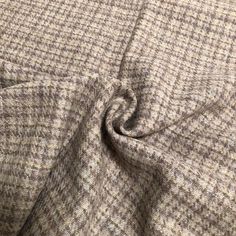 a close up view of the fabric on a jacket