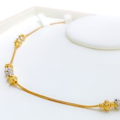 Elevate your ensemble with the Stylish Palatial 22k Gold Necklace. Weighing 10.0 grams and crafted with a purity of 22k, this necklace exudes sophistication. Its combination of yellow and white gold finishes adds a modern twist to its palatial design. With a length of 18 inches and non-adjustable links, it drapes elegantly around the neck. Secured with an S lock style, this necklace ensures both security and style. Make a statement with the refined allure of this exquisite gold necklace. PRODUCT Dual-tone Gold Plated Necklace, Elegant 22k Gold Yellow Chain Necklace, Elegant Dual-tone Necklaces For Formal Occasions, Elegant Dual-tone Necklace For Formal Occasions, Elegant Dual-tone Formal Necklaces, Elegant Formal Dual-tone Necklace, Elegant Gold Dual-tone Necklace, Elegant Dual-tone Gold Necklace, Elegant Dual-tone Bridal Necklace