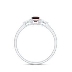 Product Details The Garnet Solitaire Ring features an Octagon Cut Garnet as Solitaire embellished in Prong Setting with Round Shape Diamond gemstones as Trio embellished in Prong Setting, especially for you. Product Information SKU SHP-RINGS122043968 Width 3.5 mm Height 6.1 mm Weight 1.60 gm (Approximate) GARNET INFORMATION No.of Stones 1 Pieces Total Weight 0.70 Carat (Approximate) Dimension(approx) Emerald Cut-4X6 mm-1 Pcs Color Red Cut Brilliant Shape Emerald Cut Setting Type Prong-Setting Quality Grade AAA DIAMOND INFORMATION No.of Stones 6 Pieces Total Weight 0.29 Carat (Approximate) Dimension(approx) Round-2X2 mm-6 Pcs Color HI Cut Brilliant Shape Round Setting Type Prong-Setting Quality Grade SI View More Product Parent Collection Handle garnet-rings 18k Yellow Gold Ring, Ring Sizer, Garnet Rings, Especially For You, Diamond Gemstone, Yellow Gold Rings, Solitaire Ring, Emerald Cut, Prong Setting