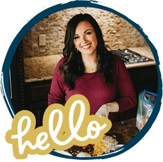 a woman standing in front of a plate with food on it and the words hello