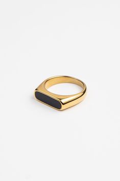 PRODUCT DETAILS Waterproof💧💧💧 Stainless Steel 18K Gold Hypoallergenic Nickel Free DESIGNER NOTE Introducing the black stone version of one of our favorites. This classic color combination is sure to match any outfit for any occasion. STYLE TIP: Stack this ring with the Chain Ring for a sophisticated look. Minimalist Onyx Signet Ring For Formal Events, Minimalist Onyx Signet Ring For Formal Occasions, Minimalist Onyx Rings For Formal Occasions, Minimalist Onyx Ring For Formal Occasions, Modern Black Rings For Formal Occasions, Sleek Black Jewelry For Formal Occasions, Modern Yellow Gold Signet Ring With Black Enamel, Modern Black Enamel Signet Ring, Sleek Gold Ring With Polished Finish