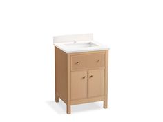 a bathroom sink sitting on top of a wooden cabinet next to a white countertop