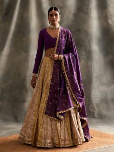 Editor's Note Purple Linen Blouse With A Silver Gold Panelled Lampi Lehenga. The Dupatta Is In Linen With Customised khari Block And Intricate Zardosi Dabka Embroidery. Fabric: Linen Color: Purple, gold Care: Dry Clean Only About the Designer Itrh makes a high-end luxury Indian ethnic wear made using exquisite and endangered age-old crafts such as kalamkari, madhubani, chikankari, zardozi, and gota weaving. The focus of the house is to cherish the beauty of handcrafted luxury designer wear. Dabka Embroidery, Golden Lehenga, Gold Lehenga, Purple Linen, Organza Lehenga, Desi Clothes, Linen Color, Purple Blouse, Chaniya Choli