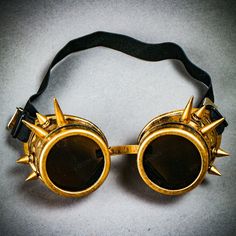 This Black Steampunk Goggles With Spikes Is A Great Costume Accessory Or Cosplay Dress Up For Halloween Party, Music Festival, Ball, Wedding, And Any Cosplay Event Specifically Designed With The Trendy Steampunk Style For Luxury And Mysterious Look Unique Eye-Catching Costume Goggles Helping You Stand Out In The Party The Item Is Carefully Handmade With Durable High-Quality Material To Provide Comfortable Long Hours Of Wearing @Usm-G1006-Bkgo Steampunk Adjustable Masks And Prosthetics For Festivals, Adjustable Steampunk Masks And Prosthetics For Festival, Adjustable Punk Costume Accessories For Masquerade, Adjustable Gold Costume Accessories For Cosplay, Punk Style Adjustable Costume Accessories For Cosplay, Steampunk Adjustable Masks And Prosthetics For Party, Steampunk Gold Costume Accessories For Cosplay, Gold Steampunk Costume Accessories For Cosplay, Steampunk Costume Accessories For Cosplay In Gold