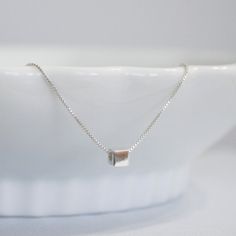 Sterling Silver Cube Necklace Everyday by alexandreasjewels Silver Rectangular Charm Necklace With Delicate Chain, Minimalist Silver Chain Charm Necklace As Gift, Minimalist Silver Chain Charm Necklace For Gift, Sterling Silver Charm Necklace With Square Pendant, Silver Charm Necklace With Square Pendant And Delicate Chain, Minimalist Sterling Silver Charm Necklace With Box Chain, Dainty Sterling Silver Charm Necklace With Square Pendant, Silver Cube Jewelry For Gifts, Minimalist Silver Charm Necklace With Box Chain