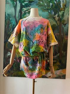 1980s  90s rainbow sea life print tunic  ↓ Measurements↓  Shoulders:  23"  Length:  33"  Bust:  up to 50"  Waist:  28. -50"    Condition:  Excellent  Label:  beached Material:  cotton   Item Number: TPF-10,766 Oversized Multicolor Summer Tops, Retro Multicolor Print Beach Tops, Retro Multicolor Print Tops For Beach, Rainbow Graphic Print Top For Summer, Rainbow Graphic Print Tops For Summer, Colorful Abstract Print Tops For Summer, Multicolor Abstract Print Tops For The Beach, Multicolor Printed Beachwear Tops, Colorful Abstract Print Summer Tops