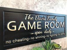 there is a sign that says the davis family game room