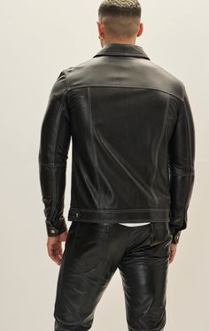 Crafted from premium leather, this jacket boasts durability and a luxurious feel. The leather is typically sourced from high-quality hides, ensuring a supple texture and robust performance. The stitching is often reinforced for longevity, emphasizing both style and functionality. SIZE + FITTailored fit, to find your correct size use the ''what's my size '' button. COMPOSITION 100% Lambskin LeatherMade in TurkeyStyle #: 71479CARESpecialist Leather Clean Only Masculine Long Sleeve Leather Jacket For Work, Long Sleeve Leather Jacket For Work, Masculine Styled Fitted Leather Jacket For Work, Workwear Leather Jacket With Contrast Stitching, Casual Black Leather Jacket With Contrast Stitching, Leather Long Sleeve Outerwear With Contrast Stitching, Leather Jacket With Contrast Stitching For Work, Classic Leather Jacket With Contrast Stitching, Leather Outerwear With Contrast Stitching Long Sleeve