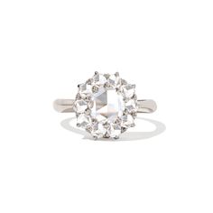 Item Details: One natural rose cut center diamond weighing approx. 0.70-0.80 ctw, F/G color VS2 clarity. Ten natural old mine cut diamonds weighing 1.00 ctw, F/G color VS clarity. The band is 2mm wide and half round. Cluster Diamond Ring With Rose Cut Diamonds, Timeless Lab-grown Diamond Ring With Rose Cut Diamonds, Diamond Cluster Ring With Rose Cut Diamonds, Promise Cluster Ring With Rose Cut Diamonds, Rose Cut Diamond Cluster Ring, Fine Jewelry Lab-grown Diamond Ring With Rose Cut, Timeless Diamond Ring With Rose Cut Diamonds, Diamond White Cluster Rose Cut Wedding Rings, Heirloom Diamond White Diamond Ring With Rose Cut