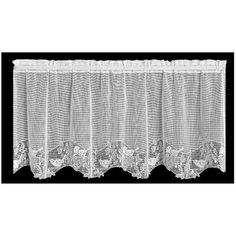 a white curtain with an animal design on the bottom and lace trim around it's edges