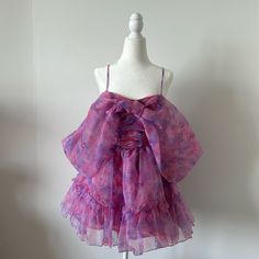 Sugar Thrillz, Non-Stretch Organza, Watercolor Print, Oversized Bow, Adjustable Shoulder Straps, Front Lace Up Detailing Trim. Fashion Fairytale, Sugar Thrillz, Dolls Kill, Watercolor Print, Doll Dress, Shoulder Straps, Lace Front, Fairy Tales, Colorful Dresses