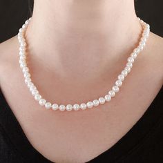 Make any occasion a special event with the addition of pearls. This cultured freshwater pearl strand has a 14K white gold filigree clasp. Due to the unique nature of pearls, shade of color, shape or texture may vary slightly from photo. Classic Single Strand Pearl Necklace Gift, Classic Single Strand Pearl Necklace As Gift, Formal Single Strand Pearl Necklace, Classic Pearl Necklace With Round Pearl Drop, Classic Pearl Necklace With Round Beads And Pearl Drop, Classic Akoya Pearl Necklace For Anniversary, Elegant Pearl Necklace With Sterling Silver Clasp, Classic Pearl White Necklace With Pearl Drop, Classic Single Strand Pearl White Necklace