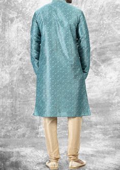 Ready-Made Kurta, With Churidar Pajama. Embroidery, Pintux, and Jacquard Art Silk kurta. Dupion Ready Made Churidar Pajama. Crafted in Chinese Collar Neck, and Full Sleeve. High-Quality Matching Buttons. Please Note: The footwear shown in the picture is for presentation and photography purposes only. Color: There might be slight color variation due to lighting and flashes while the photo shooting. The color may also vary because of different screen resolutions. Wash Care: Dry Clean Only. Art Silk Churidar With Intricate Embroidery For Eid, Embroidered Brocade Sets For Navratri, Eid Art Silk Churidar With Intricate Embroidery, Eid Brocade Sets With Intricate Embroidery, Festive Jacquard Set With Dupatta, Festive Jacquard Sets With Dupatta, Fitted Jacquard Set For Festive Occasions, Embroidered Jacquard Wedding Sets, Wedding Embroidered Jacquard Sets