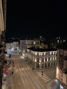 an aerial view of a city street at night