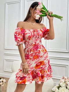 This elegant dress features a flowy off-shoulder design Chic Off Shoulder Puff Sleeve Dress For Spring, Spring Off-shoulder Puff Sleeve Dress For Brunch, Flowy Floral Dress With Puff Sleeves And Ruffles, Summer One Shoulder Puff Sleeve Dress For Brunch, Off-shoulder Puff Sleeve Summer Dress For Brunch, Off-shoulder Puff Sleeve Dress For Summer Brunch, Chic One-shoulder Puff Sleeve Summer Dress, Chic One Shoulder Puff Sleeve Summer Dress, Fitted Floral Dress With Ruffle Hem And Puff Sleeves