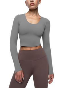 PRICES MAY VARY. Cream Collection Top: Crop tops are made from soft fabric that feels cream smooth on your skin. They are lightweight, breathable, quick-drying, moisture-wicking and resistant to sweat stains brings you the best sports experience. Removable Padding Bra: Yoga crop tops for women feature an inner removable cups with hidden small opening on both sides, easy to clean and adjust. The pad cups provide support and shock protection. U Neck Design: Athletic shirts tops cut with flattering Solid Scoop Neck Top For Pilates, Fitted V-neck Top For Pilates, Scoop Neck Tops For Pilates, Workout Stretch Top In Solid Color, Fitted Solid Color Workout Tops, Gray Scoop Neck Top For Workout, Stretch Gray Tops For Pilates, Fitted Gray Moisture-wicking Top, Gray Fitted Moisture-wicking Top