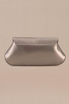 Metallic toosh clutch in faux leather base with corded flap.
Composition: 100% PU/Faux Leather
Color: Silver
Other Details: 
Dimensions (in inches): L x W x D: 10 x 1.8 x 4.5 - Aza Fashions Leather Clutch With Removable Pouch For Party, Elegant Leather Clutch With Fold Over Clasp, Silver Leather Evening Bag For Formal Occasions, Elegant Silver Leather Clutch, Formal Clutch Evening Bag With Fold Over Clasp, Formal Silver Leather Evening Bag, Formal Evening Clutch With Fold Over Clasp, Leather Pouch Clutch For Parties, Silver Clutch With Magnetic Closure For Formal Occasions