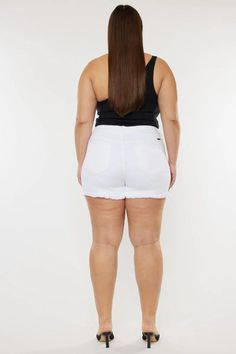 Cleo High Rise Shorts (Plus Size) by Kancan | The Ultimate Denim Shop | Premium denim meets comfort | Designed in Los Angeles. Our Cleo High Rise Shorts is perfect for Summer. Get comfortable in our stretch white color denim that accentuates your curves and is great for everyday wear. Features a fun frayed hem, a single button, optic white color, and distress! Shop now! trendy plus size shorts, high waisted plus size shorts, stylish plus size shorts, plus size casual wear, summer fashion Stretch Mid-rise White Jean Shorts, White Stretch Mid-rise Jean Shorts, Casual White Bottoms With Frayed Hem, White Stretch Cutoff Jean Shorts, White Bottoms With Frayed Hem For Summer, White Stretch Mid-rise Shorts, White Mid-rise Bottoms With Frayed Hem, High Waist White Bottoms With Frayed Hem, White High-waist Bottoms With Frayed Hem