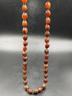 Very beautiful vintage old pumpkin oval shape Carnelian necklace Antique Amber Necklace With Polished Beads, Antique Amber Necklaces With Polished Beads, Antique Brown Necklace For Collectors, Handmade Brown Oval Necklace, Traditional Oval Necklaces With Polished Beads, Vintage Orange Oval Beads Jewelry, Traditional Amber Oval Jewelry, Traditional Oval Amber Jewelry, Antique Oval Necklace With Natural Stones