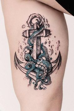 an anchor and octopus tattoo on the thigh