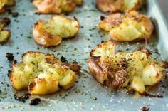 roasted cauliflower on a baking sheet ready to be cooked