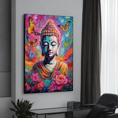 a buddha painting hanging on the wall in a living room