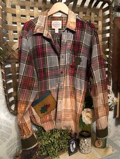 This one-of-a-kind women's flannel is handmade and is perfect for any occasion, whether it's a casual day out or a fancy cocktail party. The shirt features a green/red  check pattern with a collared neckline and button closure. The long-sleeved shirt is made of 100% cotton flannel material with a stitched on wool pocket  patches embellishments and button accents, adorned with Holly and wool stitched on the cuffs!  Santa Iron on patch! The shirt makes a great winter Xmas shirt for the Holidays!  making it an excellent choice for bohemian-themed events. It comes with a Santa iron-on on the backsize  Oversized!  A hand designed women's XL! No two are the same, I use new or like new flannels and distress them and create unique pieces! Comes with a free headband piece of Plunder  listed! Thank Fitted Flannel Shirt For Fall, Fancy Cocktail Party, Bleached Flannel Shirt, Bleached Flannel, Cocktail Chic, Plunder Jewelry, Fancy Cocktails, Flannel Dress, Flannel Women