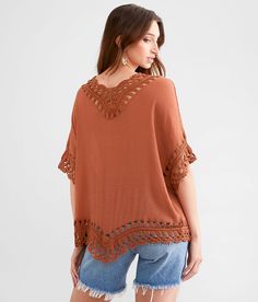 Women's Macrame Top In Brown By Daytrip., Women's Henna Textured knit handkerchief hem top Bust measures 42 on size small Body length 23 on size small. 100% Polyester. Hand wash cold. Do not bleach. Lay flat to dry. Cool iron if needed.. Measurements: Bust -Fullest part of bust with arms at sides. Waist -Circumference of natural waist: above belly button below rib cage. Hips -Standing with feet together fullest part of hips. WOMEN'S TOP SIZE CONVERSION CHART Size US/CAN BUST WAIST XXS 00 29-30 2 Bohemian V-neck Tops For Layering, Bohemian Cotton Crochet V-neck Top, V-neck Tops With Crochet Trim For Vacation, Bohemian V-neck Knit Top For Beach, Bohemian Crochet Top With Crochet Trim For Fall, Fall Crochet Top With Crew Neck And Crochet Trim, Fall Crochet Crew Neck Top With Crochet Trim, Fall Crochet Trim Crew Neck Top, Bohemian Crew Neck Top For Layering