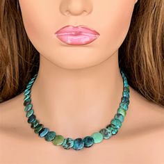 Simply beautiful, this Turquoise choker necklace looks great on!  The 16 inch natural stone necklace features genuine Turquoise stones that are graduated in size and overlap each other.  It closes with a small brass lobster claw clasp.  If you would like to have an extension chain added at no extra cost, please use the drop down menu to choose an option. This necklace is designed and handmade by me, Sharon, of Blonde Peach Jewelry. It will arrive in an attractive organza bag that is great for st Peach Jewelry, Blue Green Turquoise, Turquoise Choker, Natural Stone Necklace, Trendy Fashion Jewelry, Real Turquoise, Handmade Beaded Necklaces, Natural Stones Necklace, Turquoise Stones