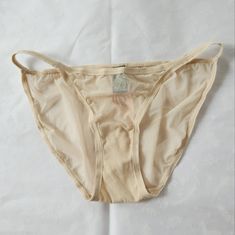 Nwt Victoria's Secret Body By Victoria Low Rise String Bikini Panties Nude Color Xs Vintage And Hard To Find Brand New Sexy Fitted Seamless Summer Slip, Seamless Fitted Summer Slip, Seamless Fitted Slip For Summer, Summer Seamless Fitted Slip, Beige Brief Swimwear For Summer, Seamless Briefs For Summer, White Lace Garter, Cami Mendes, Victoria Secret Body