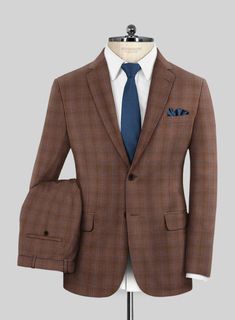 Enhance your appearance with a dash of finesse by wearing our Reda Nutmeg Brown Checks Wool Suit. Made from pure wool fibers, resulting in a beautifully smooth fabric that provides extra warmth during colder seasons. The cool-toned n utmeg  brown color is subtly varied, creating a check design with blue fleece that adds depth to the hue. This suit is an excellent alternative to the usual rotation of gray and navy suits without being too bold. It's perfect for high-class occasions and outings. Fitted Winter Suits With Welt Pockets, Fitted Winter Suits For Semi-formal Occasions, Winter Semi-formal Fitted Suit, Brown Wool Flat Front Suit, Fitted Wool Suits For Fall, Fitted Wool Suit For Fall, Fall Wool Fitted Suit, Fitted Winter Suits For Tailoring, Timeless Fitted Suits For Fall