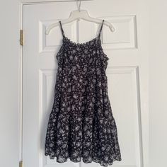 Never Worn, Tags Still On. Super Cute For Parties! Nothing Wrong With It Just Selling Cause Doesn’t Fit Me. Black Sundress With Ruffles, Black Ruffled Sundress, Casual Mini Dress By Urban Outfitters, Black Cotton Vacation Dress, Black Floral Print Summer Sundress, Black Floral Print Sundress, Black Floral Print Midi Sundress, Urban Outfitters Black Floral Print Dress, Urban Outfitters Black Floral Dress