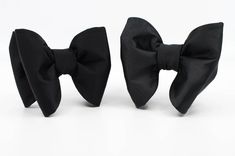 Black Standard Tie With Bow, Classic Black Bow Suit And Tie Accessories, Party Bow Tie With Black Ribbon, Party Bow With Black Ribbon In Standard Tie, Party Standard Tie Bow With Black Ribbon, Party Bow With Black Ribbon, Black Bow Ties For Black-tie Events, Black Tie With Decorative Bow For Black-tie Events, Black Party Ties With Decorative Bow