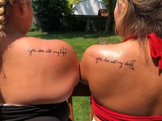 two women with tattoos that say you are all my life