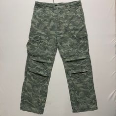 [DESCRIPTION] Please read the description first before buy my items‼️‼️‼️ Vintage Camp David Multipocket Tactical Camo Cargo Pants All in good condition [MATERIAL] Cutton [MEASUREMENT] Measurement ( WHEN LAID FLAT ): Waist: 36 inch (recommended) Insean: 30.5 inch Length: 41.5 inch Front Rise: 12 inch Thigh: 23 inch Opening Leg: 19 inch [CONDITION] - All in good condition  - No hole no stain [PAYMENT & NOTICE] - We accept PayPal ONLY - No return/refund - All items will be post over shipping compa Outdoor Cargo Jeans With Multiple Pockets, Cargo Jeans With Pockets For Outdoor Activities, Camouflage Parachute Pants With Cargo Pockets, Camouflage Straight Leg Parachute Pants With Cargo Pockets, Combat Cargo Pants With Pockets, Straight Leg Camouflage Parachute Pants With Cargo Pockets, Combat Style Cargo Bottoms For Outdoor Activities, Camouflage Straight Leg Parachute Pants With Side Pockets, Combat Cargo Bottoms For Outdoor Activities