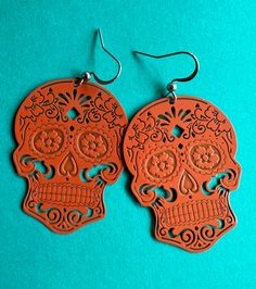 Earrings Handmade Skull Earrings For Day Of The Dead, Metal Skull Single Earring, Skull Shaped Metal Earrings, Silver Skull Earrings With Skull Print, Nickel-free Skull Jewelry For Day Of The Dead, Nickel Free Skull Jewelry For Day Of The Dead, Skull-shaped Metal Earrings With Ear Wire, Metal Skull Earrings With Ear Wire, Nickel Free Metal Skull Earrings