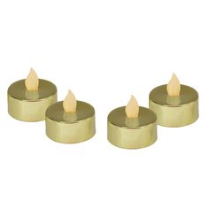 three small candles are sitting on a white surface