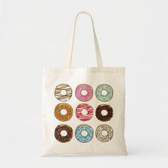 a tote bag with donuts printed on the front and sides, all in different colors