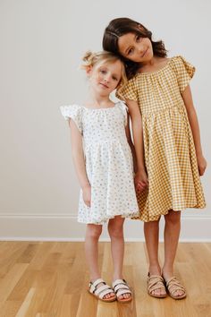 Product Description THIS ITEM IS NOW PREORDER, ANTICIPATED SHIP DATE IS 6/12/23 This is the no-stress daytime dress that kids and parents love! Think Plain Jane’s signature softness, but with some extra durability thanks to our new cotton + spandex blend. The simple, beautiful Everyday Dress is made to stand the test of playtime! *The Everyday Dress in Honey Gingham and Ditsy Daisy run slightly smaller than other Everyday Dresses. If in between sizes, we recommend sizing up. Color Description Di Playful Spring Twirl Dress For Playdate, Playful Cotton Dresses For Daywear, Playful Spring Sundress For Playdate, Spring Flutter Sleeve Twirl Dress For Playdate, Spring Playtime Twirl Dress With Flutter Sleeves, Fitted Cotton Twirl Dress For Playdates, Spring Cotton Sundress For Playdates, Fitted Flutter Sleeve Dress For Playdate, Fitted Flutter Sleeve Twirl Dress For Playdate