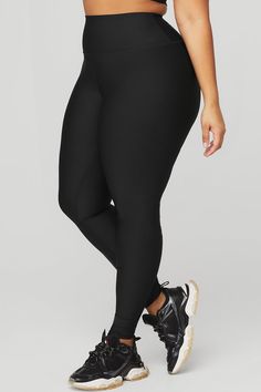 Just as perfect for out and about as they are for a good sweat session. These leggings are made from Airlift—our most compressive, supportive fabric with a sheeny finish and four-way-stretch for a glove-like fit. The high-rise waistband is double-layered for a sleek look, and the full-length legs are designed to hit at the ankle. Choose your favorite color(s) and get ready to wear yours on repeat. Versatile Solid Compression Activewear, Versatile Compression Activewear In Solid Color, Alo Yoga High Stretch Sporty Yoga Pants, Compressive Solid Color Workout Tights, Compressive Versatile Sports Tights, Versatile Compressive Sports Tights, Sporty Alo Yoga Pants, Compressive Bottoms For Sports, Compressive Sports Bottoms