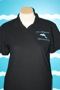 Order this great school spirit polo for the teacher in your life, We will help to pick a stock logo design and change the text to your school info. The shirt comes in a ladies Size Small thur 3X if needed we can also get the polo in a unisex cut polo up to a 3X. Please ask if you need help we are more then happy to help with you needs. The polo is a great soft Egyptian cotton blend shirt, they hold there color well and do not pill like some other polos do. If you need more info on the shirt we w Cotton Short Sleeve Polo Shirt For College, Cotton Polo Collar T-shirt For College, Fitted Cotton Polo Shirt For School, Basic Cotton School Polo Shirt, Basic Cotton Polo Shirt For School, Collared Cotton T-shirt For School, Basic School Polo Shirt, Black Cotton T-shirt For School Events, Fitted Short Sleeve Polo Shirt For School