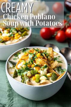 two bowls of creamy chicken poblano soup with potatoes and vegetables on the side