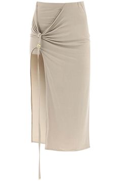 Midi skirt by Jacquemus crafted in soft-touch-effect cupro jersey with double-layer draped design. Styled with a knotted detail enriched by a buckled strap on the front, it features elasticated waistband and a deep side slit. Fitted with straight cut. The model is 177 cm tall and wears size XS. Designer Drapes, Skirts Midi, Skirts For Sale, Straight Cut, Jeans Dress, Mid Length, Double Layer, Accessories Design, Midi Skirt