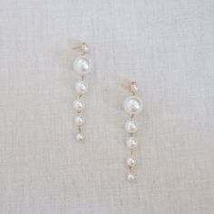 Our Pearl combination earrings look absolutely chic and classic!   --------------------------------------------------- - - It is very suitable for weddings, engagements, anniversaries, parties and daily collocations. - Holiday gift or girlfriend gift -Handmade - USA   ---------------------------------------------------   JEWELRY CARE   Please avoid contact with moisture for all jewelry. Keeping your jewelry as dry as possible will help prolong the nature of its color and shine.To clean jewelry, Elegant Pearl Embellished Dangle Chandelier Earrings, Elegant White Chandelier Earrings For Anniversary, Elegant Pearl Charm Chandelier Dangle Earrings, Elegant Pearl Charm Chandelier Earrings, Pearl Dangle Chandelier Earrings For Evening, Pearl Chandelier Dangle Earrings For Evening, Elegant Pearl White Chandelier Earrings With Pearl Drop, Elegant Long Drop Pearl Chandelier Earrings, White Pearl Chandelier Earrings For Evening