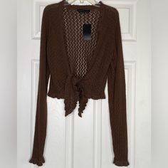 Women's Parallel Open Front Cardigan Knit Long Sleeve Brown Tie Cropped Sz Large Pit To Pit 19 Inches Sleeve 33 Inches From Wrist To Neck Length Measured In The Back From The Bottom Hem To The Neck Hem 18 Inches Ff14 Fall Open Front Open Knit Tops, Open Knit Open Front Top For Fall, Fitted Knit Open Front Top, Fitted V-neck Open Knit Outerwear, Winter Open Knit Open Front Top, Winter Open Front Open Knit Top, Brown Open Front Top For Layering, Fitted Open Front Brown Sweater, Casual Brown Open Front Top