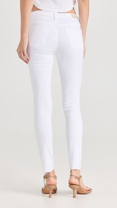 AG Legging Ankle Jeans | Shopbop Mid-rise Cotton Jeans With Frayed Hem, Fitted Mid-rise Cropped Cotton Jeans, Spring Workwear Straight Leg Jeggings, Spring Casual Elastane Jeggings, Fitted Jeggings With Frayed Hem, Stretch Cotton Bottoms With Frayed Hem, Fitted Pants With Frayed Hem And Cropped Leg, White Stretch Cropped Denim Jeans, Fitted Cotton Pants With Frayed Hem