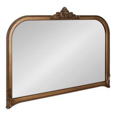 an ornate gold framed mirror on a white background